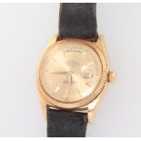 A gentleman's 18ct yellow gold day/date Rolex Oyster Perpetual wristwatch with cyclops cover to