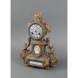 J Martin, a French 8 day striking mantel clock, the 9cm porcelain dial with Arabic numerals and