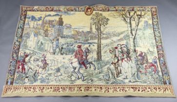 A 17th Century style machine made tapestry panel depicting mountain scene with castle, towers,