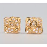 A pair of yellow metal paste set ear studs 5.6 grams Please note the stones are paste not diamonds