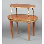 A 19th Century oval inlaid Kingwood 2 tier etagere with gilt metal mounts raised on square tapered