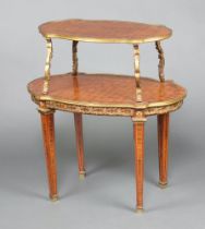 A 19th Century oval inlaid Kingwood 2 tier etagere with gilt metal mounts raised on square tapered