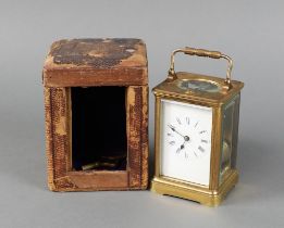 A 19th Century French 8 day striking carriage clock, the 5cm enamelled dial with Roman numerals