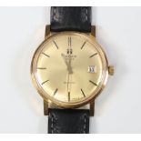 A gentleman's gilt cased Tissot calendar wristwatch the dial inscribed Sea Star on a leather strap
