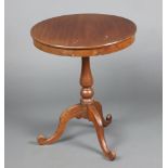 A Victorian circular mahogany snap top wine table on pillar and tripod base 72cm h x 61cm diam.