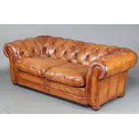 A 2 seat Chesterfield upholstered in brown buttoned leather 66cm h x 185cm w x 84cm d (seat 127cm