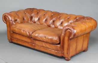 A 2 seat Chesterfield upholstered in brown buttoned leather 66cm h x 185cm w x 84cm d (seat 127cm