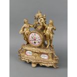 A French 19th Century timepiece with pink porcelain dial, contained in a gilt spelter case supported