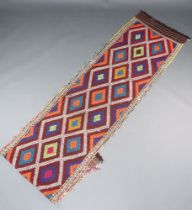 An orange, blue white and red suzni kilim runner with diamond design 328cm x 79cm