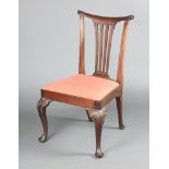 An 18th Century Irish carved mahogany side chair with vase shaped spat back and upholstered drop