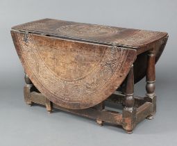 A 17th Century carved oak drop flap gateleg dining table, the top carved a figure of Boudicca with