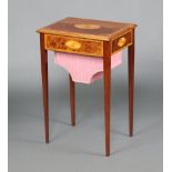 An Edwardian style rectangular inlaid mahogany work table with hinged lid and deep basket, raised on