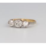 An 18ct yellow gold 3 stone diamond ring approx 1 carat, 2.6 grams, size M All of the diamonds