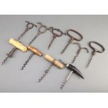 Four 19th Century eyebrow handle corkscrews, a Farrow and Jackson All Fire steel corkscrew and 5