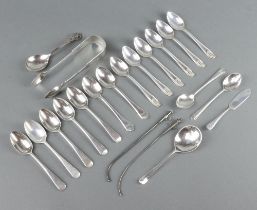 Six silver teaspoons Sheffield 1932, 10 others, a butter knife, pair of nips and 2 straws, 304 grams