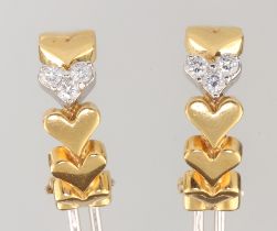 A pair of 18ct yellow gold diamond set heart earrings, the 6 brilliant cut diamonds each approx.