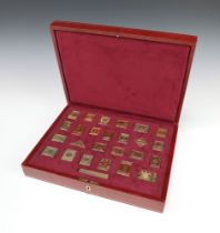 A set of 25 silver gilt stamps from The Empire Collection, no.6030 of 10,000, 466 grams, in original