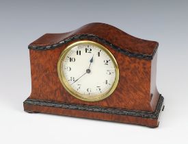 A 1920's bedroom timepiece with 8.5cm paper dial, Arabic numerals, contained in an arch shaped