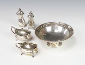 A 4 piece silver condiment set Birmingham 1921, 166 grams, together with a pedestal dish
