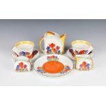 A Clarice Cliff for Wedgwood Crocus pattern "Tea For Two" part tea set comprising teapot 011248,
