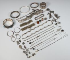 A silver bracelet and minor silver jewellery including bangles, necklaces, earrings etc, gross