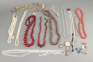 A quantity of vintage costume jewellery and watches