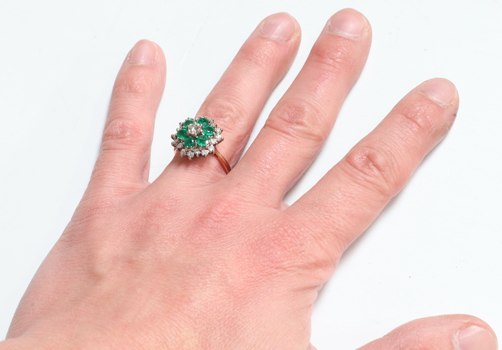An 18ct yellow gold emerald and diamond cluster ring, the 6 brilliant cut emeralds each approx. 0. - Image 7 of 7