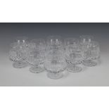 A set of 11 cut glass brandy glasses (1 a/f)