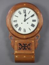 A Continental drop dial striking wall clock with 29cm painted dial, Roman numerals, contained in