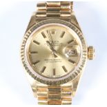 A lady's 18ct yellow gold Rolex Oyster Perpetual Datejust wristwatch on a 18ct yellow gold President