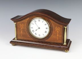 A 1930's bedroom timepiece with 9cm enamelled dial, Roman numerals, contained in an arch shaped