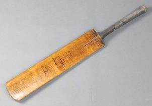 A Sandham Strudwick cricket bat bearing the signatures of the 1934 England and Australian eleven