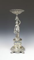 An impressive Victorian silver plated centrepiece with cut glass bowl, the stem in the form of a