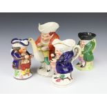A Victorian Staffordshire Toby jug in the form of a snuff taker 18cm, a ditto of a teapot with snuff