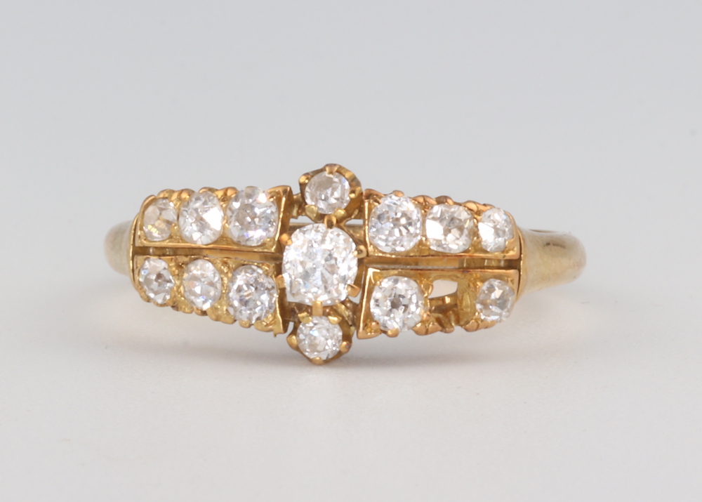 A yellow metal 18k diamond set ring (lacking one stone) 3.8 grams, size Q