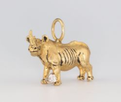 A G & G Appleby limited edition yellow metal 18k diamond charm in the form of a rhinoceros, set with