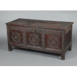 A 17th/18th Century oak coffer of panelled construction with iron lock front, 68cm h x 141cm w x