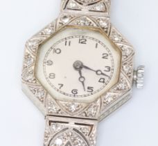 An Art Deco 18ct white gold diamond set cocktail watch with replacement winder on a silk strap
