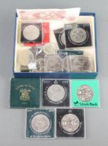 A ten shilling bank note and minor commemorative crowns and coins