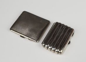 An Edwardian silver torpedo cheroot case with engraved inscription Birmingham 1902, an Art Deco