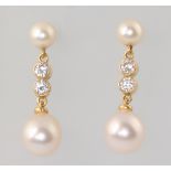 A pair of 18ct yellow gold cultured pearl and diamond drop earrings, the 4 diamonds each approx. 0.