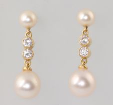 A pair of 18ct yellow gold cultured pearl and diamond drop earrings, the 4 diamonds each approx. 0.