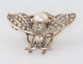 A Victorian yellow metal, diamond cultured pearl and emerald set bug brooch 6.9 grams, 26mm