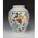 A large Poole Pottery mid-Century vase decorated with a wide band of flowers, monogrammed BND 36cm