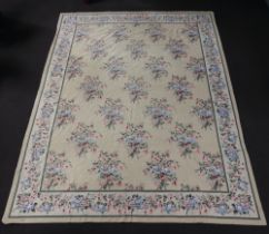 A cream ground Aubusson style rug/panel decorated fuschias, 357cm x 264 Some old moth damage and