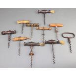 A 19th Century steel corkscrew together with 3 19th Century steel corkscrews with brushes and 6