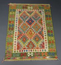 A yellow and blue ground Chobi kilim rug with all over geometric designs 151cm x 100cm