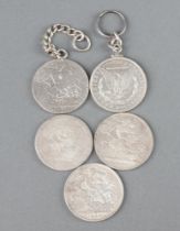 A Victorian crown 1890, 3 others and a dollar 1887 mounted as a keyring