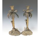 A pair of 19th Century gilt bronze candlesticks in the form of a palm trees with serpents