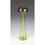 A Loetz style vase with tulip neck and spreading base 32cm
